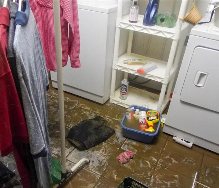 Flooded laundry room. 