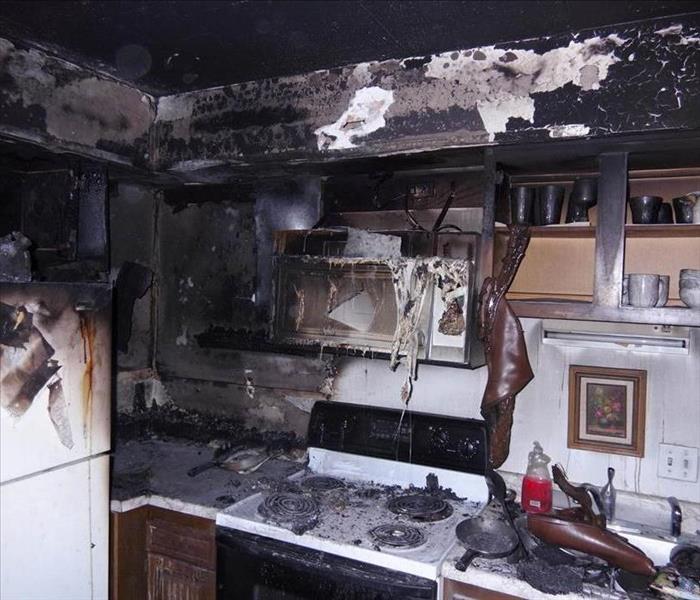 Kitchen damaged by major fire. 